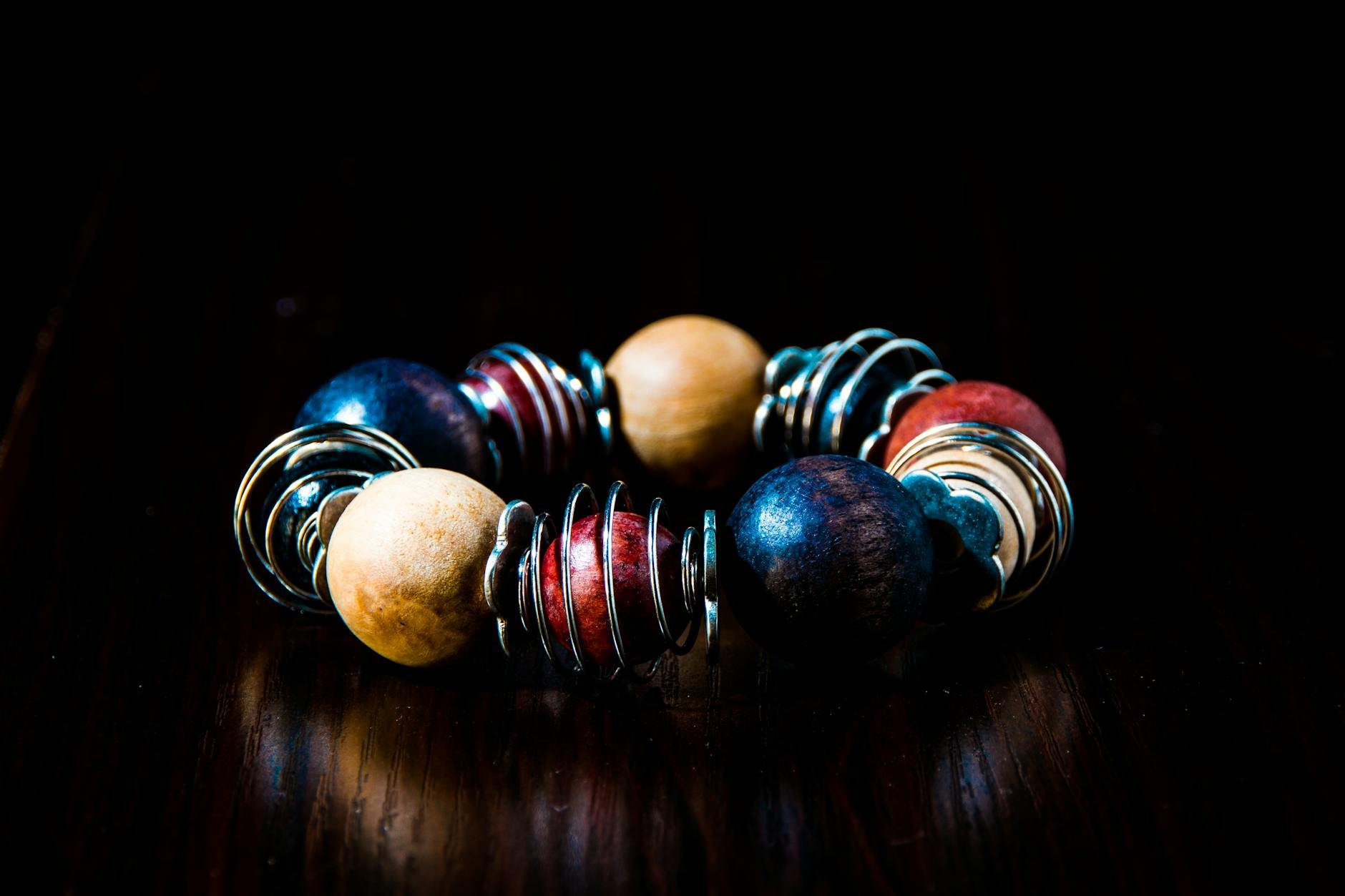 Handcrafted jewellery pieces displayed on a white background